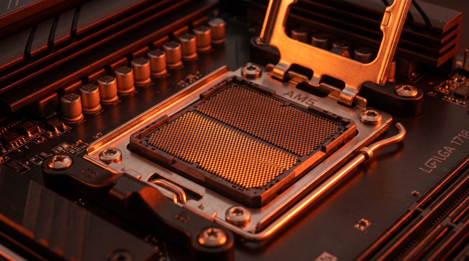 Socket AM5 gros plan avec eclairage orange evoquant la fin d une ere