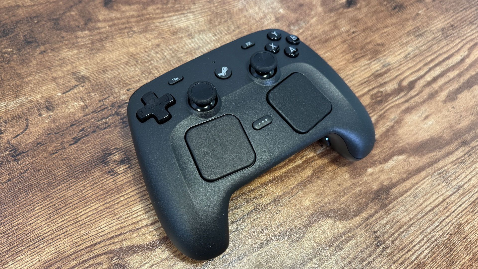 Steam Controller 2026 vue du dessus - layout boutons et trackpads